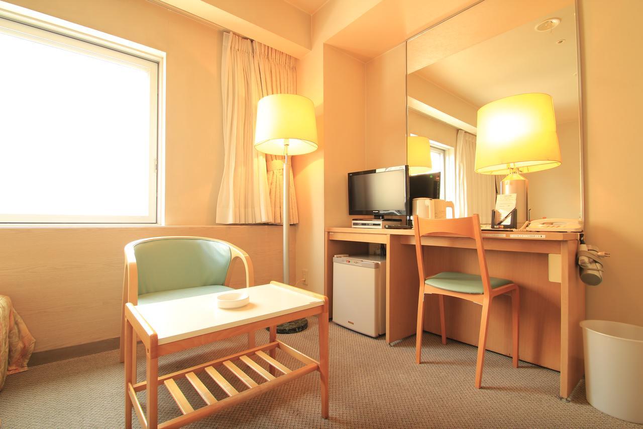 Shinsayama Daiichi Hotel Bagian luar foto
